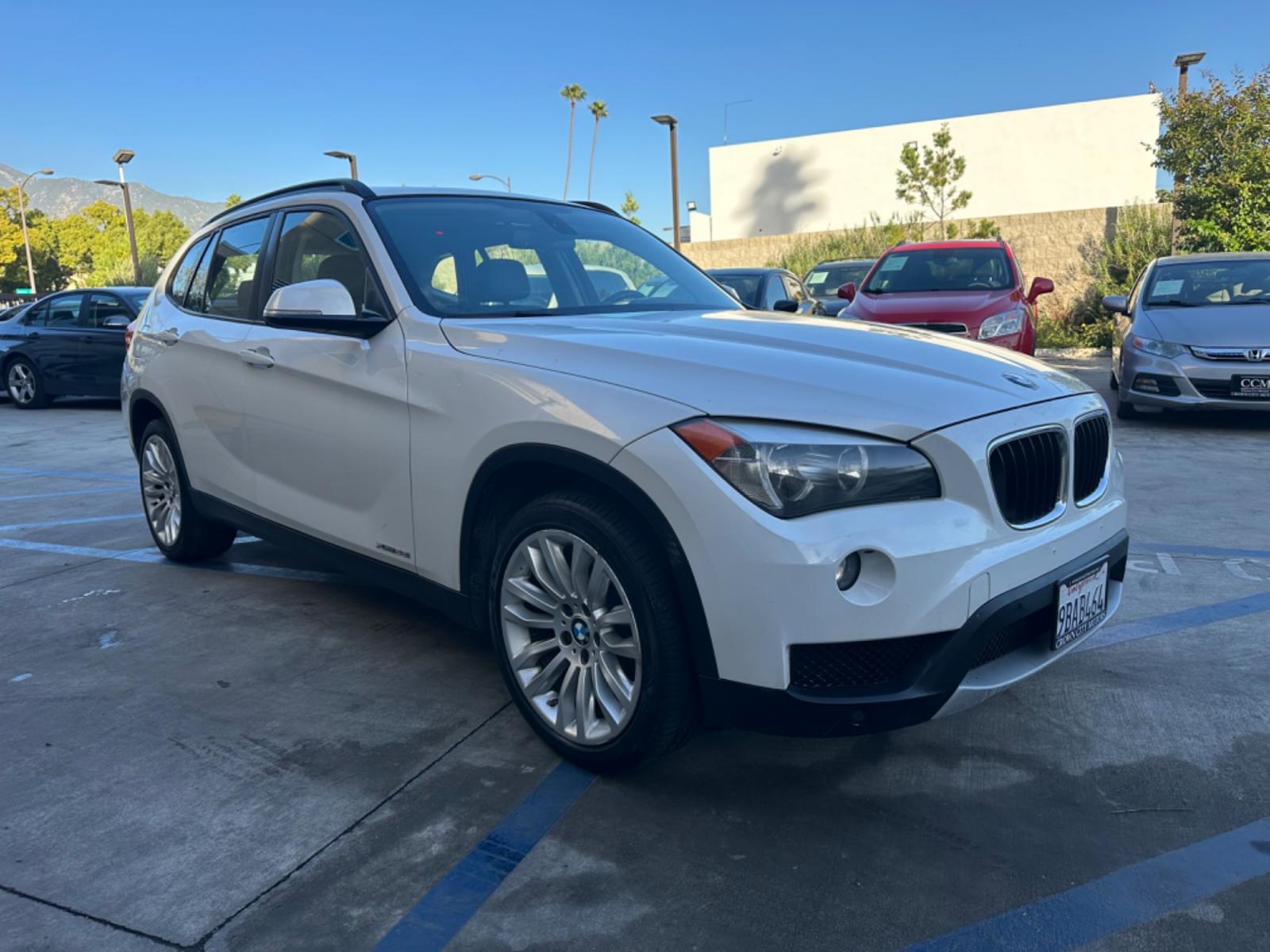 2014 WHITE /Black BMW X1 Leather (WBAVL1C56EV) with an 4 Cylinders engine, AUTOMATIC transmission, located at 30 S. Berkeley Avenue, Pasadena, CA, 91107, (626) 248-7567, 34.145447, -118.109398 - Don't let bad credit or financial setbacks hold you back from owning a luxury SUV like the 2014 BMW X1 xDrive28i. At our BHPH dealership, we're here to make the car-buying process as smooth and stress-free as possible. We invite you to visit our dealership in Pasadena, CA, to explore our inventory o - Photo #6